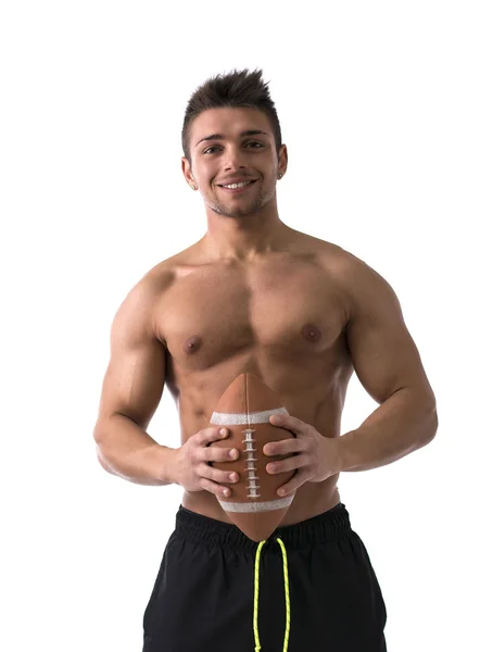 Muscular american football player shirtless with ball in hands — Stock Photo, Image