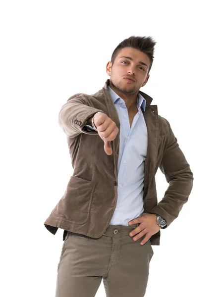 Guapo joven haciendo el pulgar hacia abajo signo — Foto de Stock