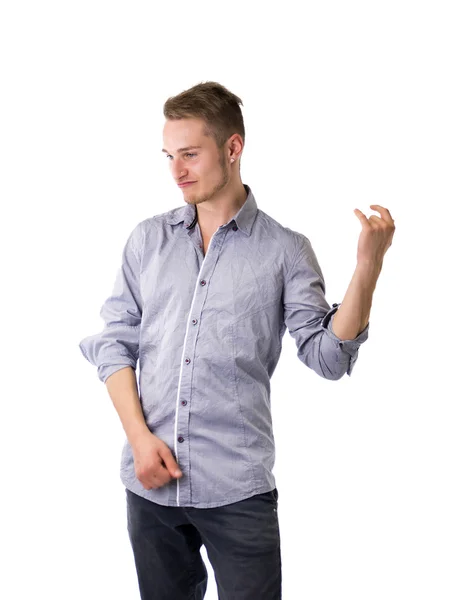 Handsome young man playing air guitar — Stock Photo, Image