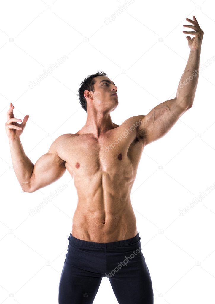 Handsome shirtless muscular young man in classic pose