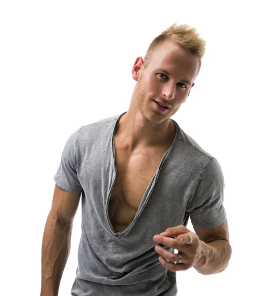 Fit male model smiling and pointing — Stock Photo, Image