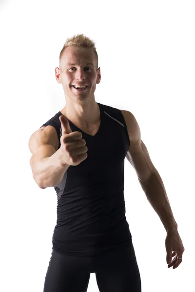 Fit male model giving a thumbs up — Stock Photo, Image