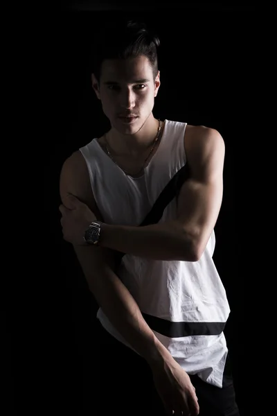 Portrait of handsome young man in white tank-top — Stock Photo, Image