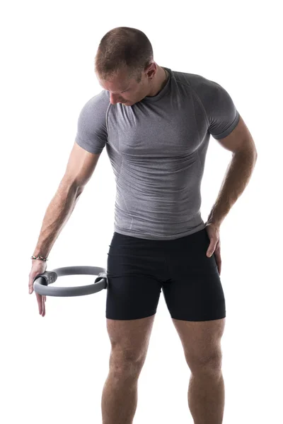 Man exercising with Pilates ring — Stock Photo, Image