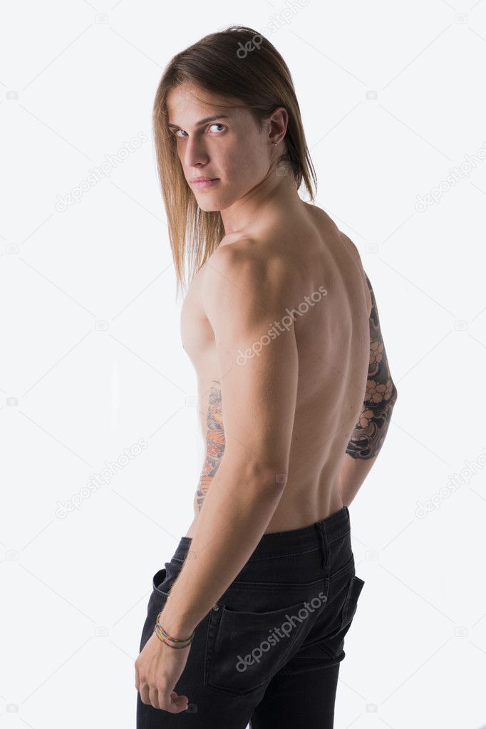 Long haired man with tattoos