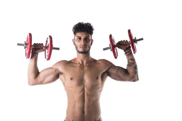 Man exercises with dumbbells — Stock Photo, Image