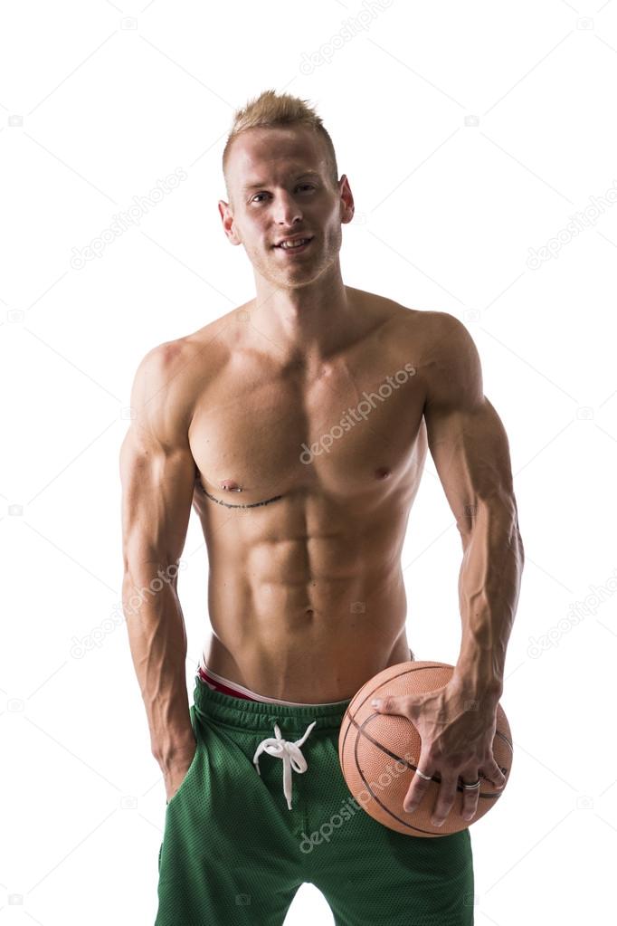 Muscular male with basketball ball
