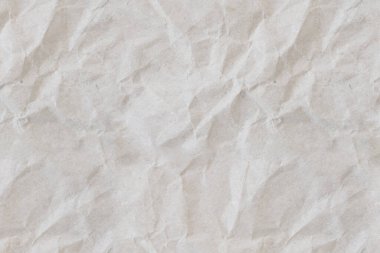 Eskimiş kağıt dokusu. Boş arkaplanı özetle. Bej rengi grunge geri dönüşümlü sıkışık yatay sayfa. Tekstil, kumaş, duvar kağıdı, ambalaj kağıdı baskısı. Boşluğu kopyala.