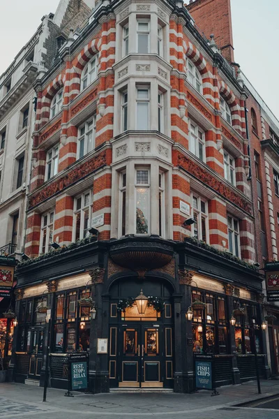 London, UK - November 23, 2021: Exterior of the Leicester Arms pub, a Victorian pub in Soho, a famous area of London with numerous shops, bars and restaurants.