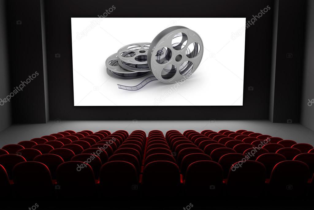 Cinema theater with reels of film on the screen.