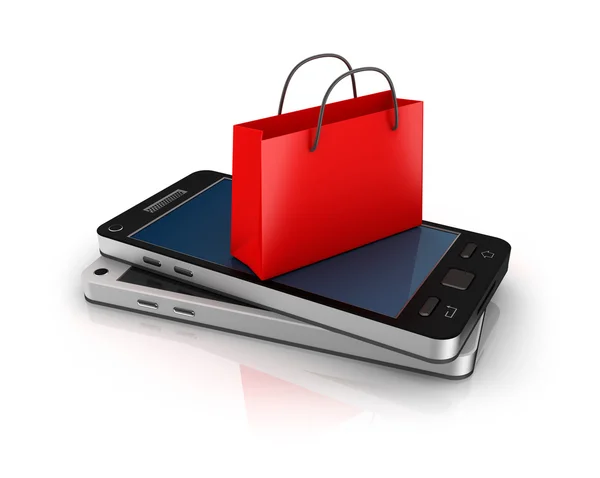 Mobiltelefon med shoppingväska. online shopping koncept. Stockbild