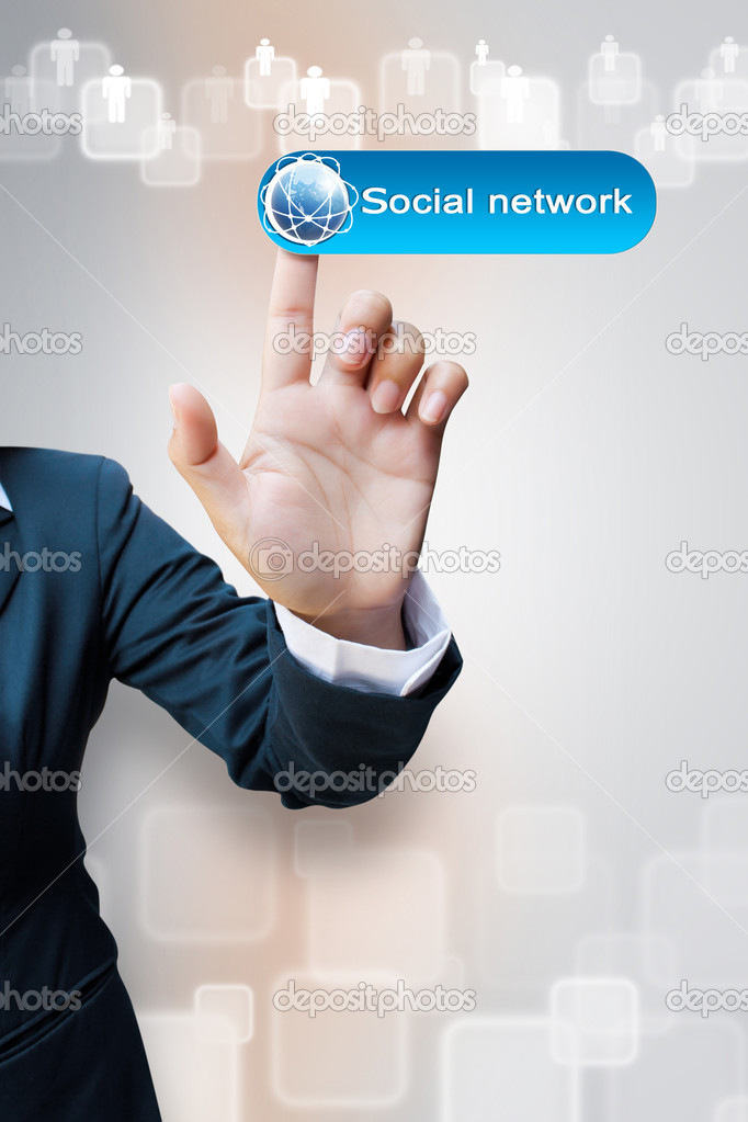 Hand of business women pushing a Social network button a touch s