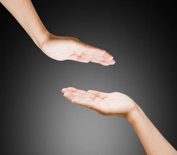Hands of women isolated on black background — Stock Photo, Image