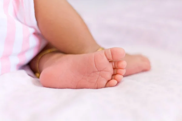 Newborn baby feet on white background — Stock Photo, Image