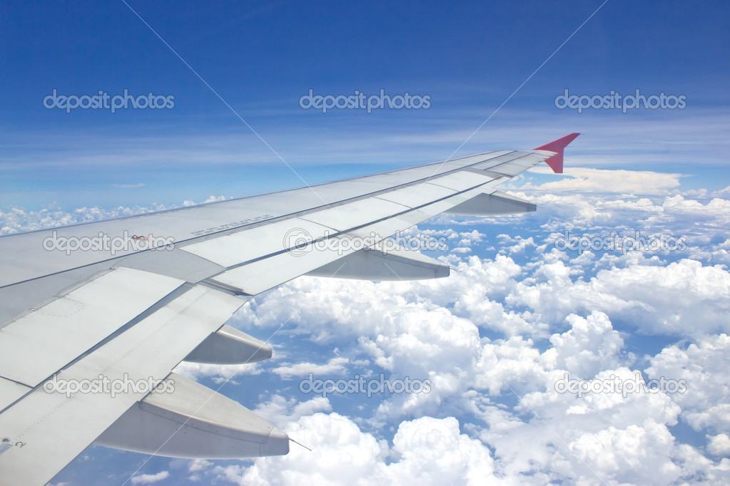 View out of airplane Airplane wing in flight 