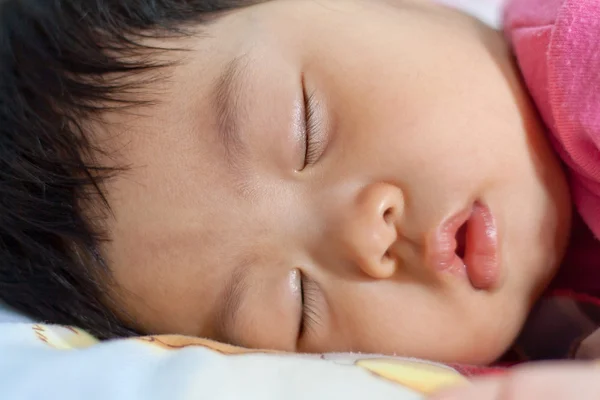 Asian newborn baby lying on bed — Stock Photo, Image