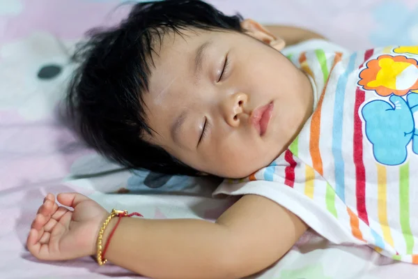 Asian newborn baby lying on bed — Stock Photo, Image