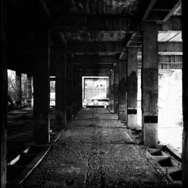 Unfinished and abandoned concrete building carcass. Abandoned building construction.