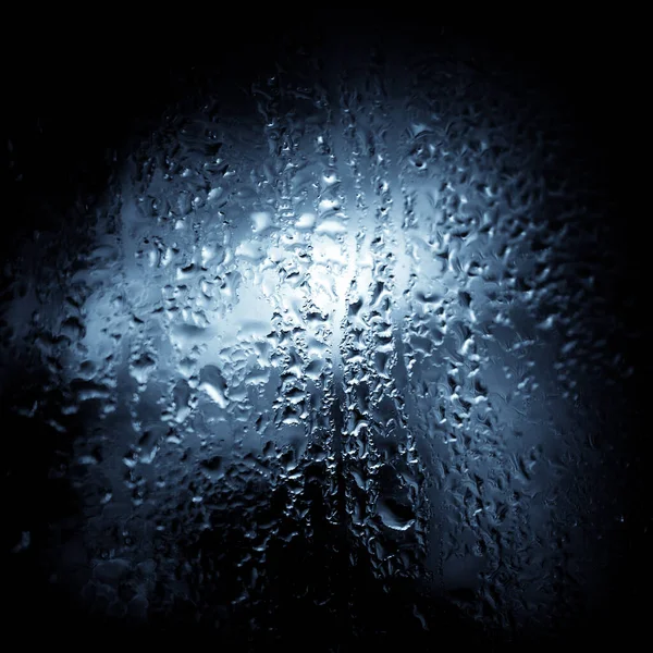 Zamknij Obraz Mokrego Szkła Niebieskim Monochromatycznym Mokre Tło Powierzchni — Zdjęcie stockowe