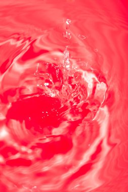 Kırmızı soyut kaotik arka plan, pürüzsüz desenli. Kırmızı sıvı yüzey dokusu.