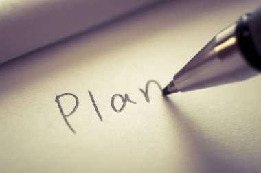 Not defteri kağıdına kelime planı yazma resmini kapat.