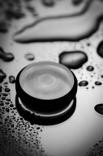 Black White Minimal Motion Blur Image Rotating Sphere Wet Surface — Stock Photo, Image