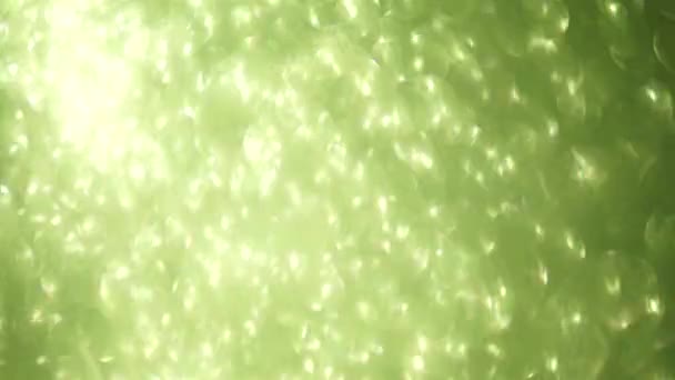 Magical light transformations glittering background. Beautiful green light leaks. — Stock Video