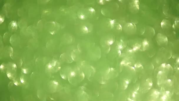 Casual zielony kolorowy bokeh futurystyczny psychodeliczny połyskujące tło. — Wideo stockowe