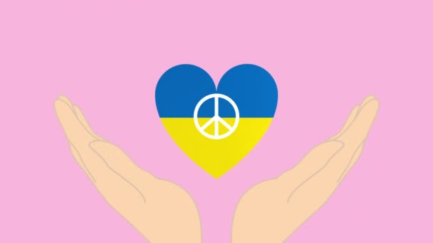 Two hands holds a symbol of peace heart in blue and yellow colors of the Ukrainian flag. — Stock Video