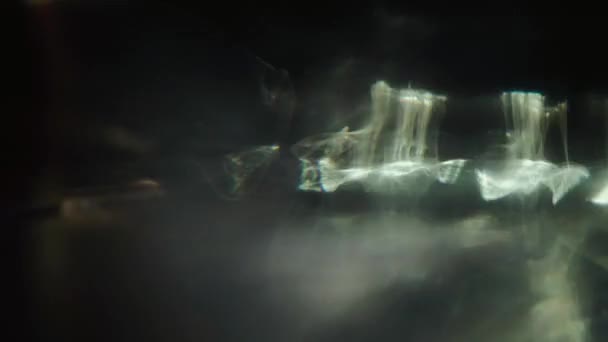 Charmantes Licht sickert holographischen Hintergrund. Nahtloses Filmmaterial. — Stockvideo