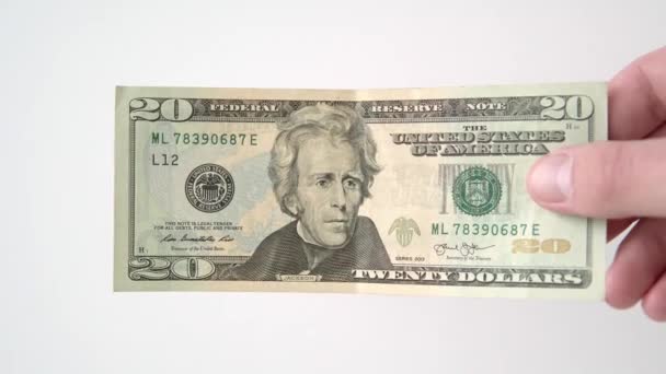 Uma Mão Mostra Uma Nota Dólares Homem Segura Uma Nota — Vídeo de Stock