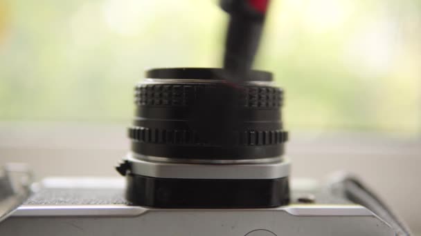 Photographer Cleaning Vintage Film Camera Lens Professional Photographic Equipment Camera — 图库视频影像