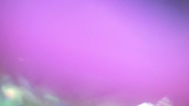 Festive colorful background. Natural light leaks. Lights glowing in the dark. Suitable for professional projects. Uhd 4k. 