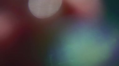 Odaksız ışık soyut efekt arkaplanı sızdırır. Yavaş hareket eden lens zarif bokeh, 4k görüntü.