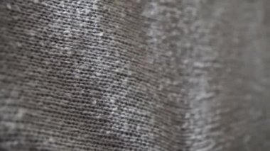 Gri akrilik eşarp örülmüş tekstil soyut arka plan. Yüksek kalite 4k görüntü.