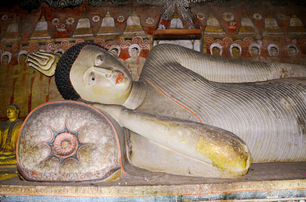 Statue of Buddha in Cave Temple in Dambulla Sri Lanka