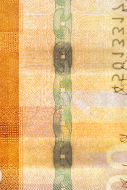 500 NOK banknotunun güvenlik şeridi. Norveç kronu üzerindeki güvenlik şeridi kalpazanları önlemek için oluşturuldu.