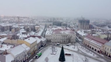 Kielce, Poland - December 27, 2021: Aerial view on market square and city hall of Kielce at winter.