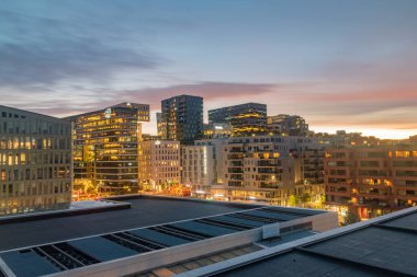 Oslo, Norway - September 24, 2021: Beautiful sunrise view on buildings in city center of Oslo.