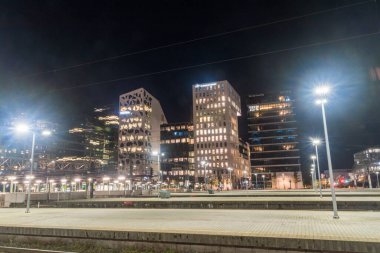 Oslo, Norway - September 23, 2021: Barcode Project buildings seen from Oslo railway station at night.