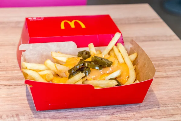Kutaisi, Georgia - 19 Mart 2022: McDonald 's Fries with Jalapeno.