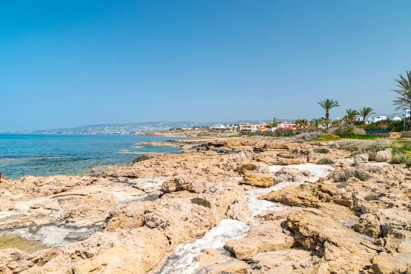 stock image Rocky coast in Cyprus. Seashore on Mediterranean sea.