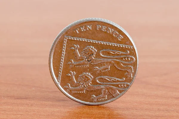 Ten Pence Coin Wooden Table —  Fotos de Stock