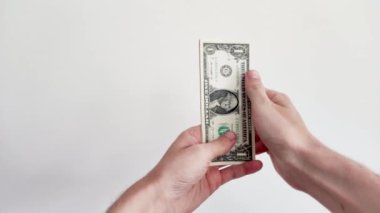 Hands counting United States dollar. Man counting American dollar 1 USD bills. Checking amount of cash money.