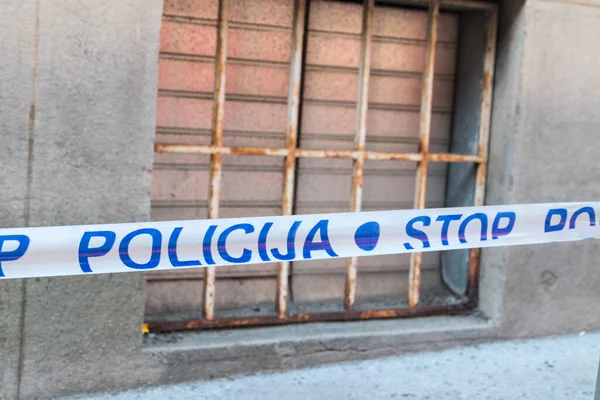 View of Police tape blocking at street in Croatia.