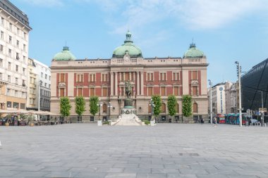 Belgrade, Serbia - June 7, 2022: Republic Square with the statue of Prince Mihailo and front facade of the National Museum of Serbia.