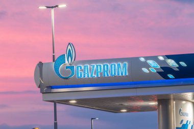 Gornja Toponica, Serbia - June 6, 2022: Logo and sign of Gazprom at gas station. Gazprom is a Russian majority state-owned multinational energy corporation.