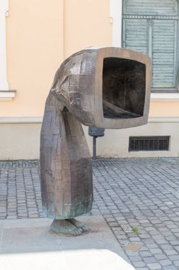 Timisoara, Romania - June 8, 2022: Coaja de om (human shell) by Mircea Roman. Modern art sculpture in city center of Timisoara.