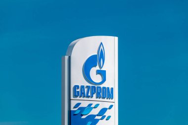 Timisoara, Romania - June 8, 2022: Detail of Logo of Gazprom on gas station. Gazprom is one of the main power and energy companies of Russia.