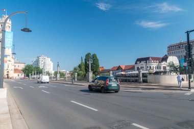 Oradea, Romania - June 10, 2022: Street view along river in city center of Oradea.